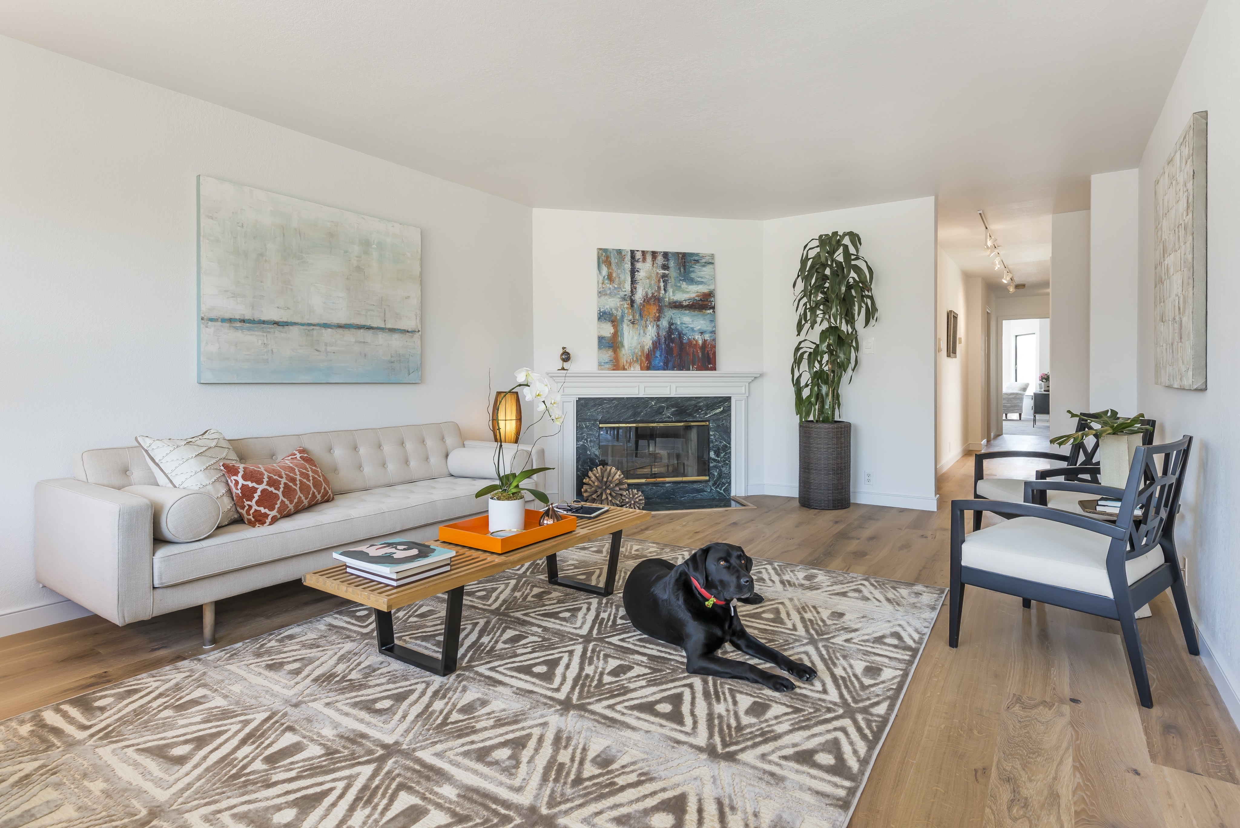 Mr. Raffi demonstrates what the kid-on-the-rug-in-front-of-fireplace-picture may look like for you at 375 15th Avenue