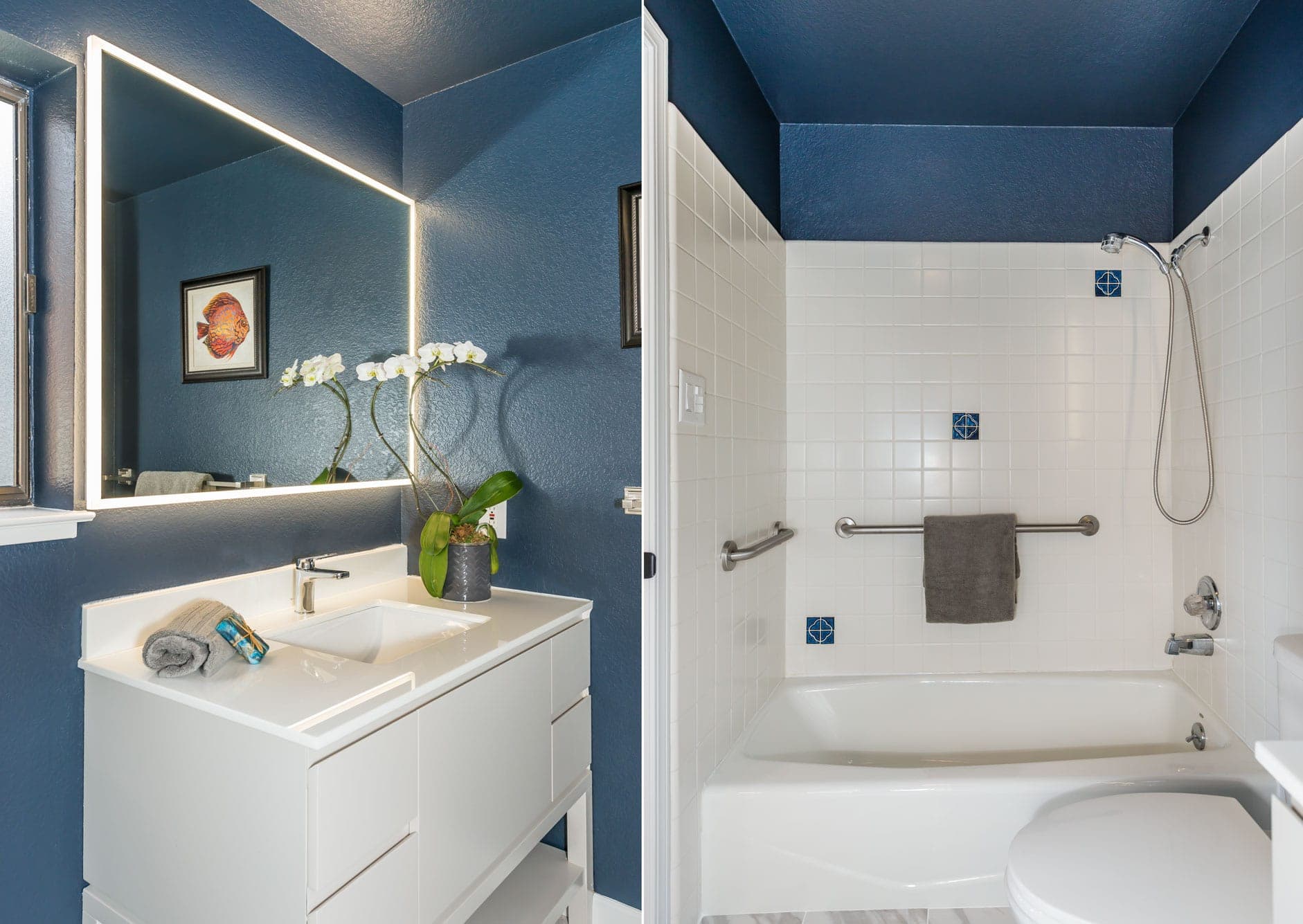Both of 375 15th Avenue's bathrooms have been updated with new designer Benjamin Moore paint, lit vanity mirror, tile and bath vanities.