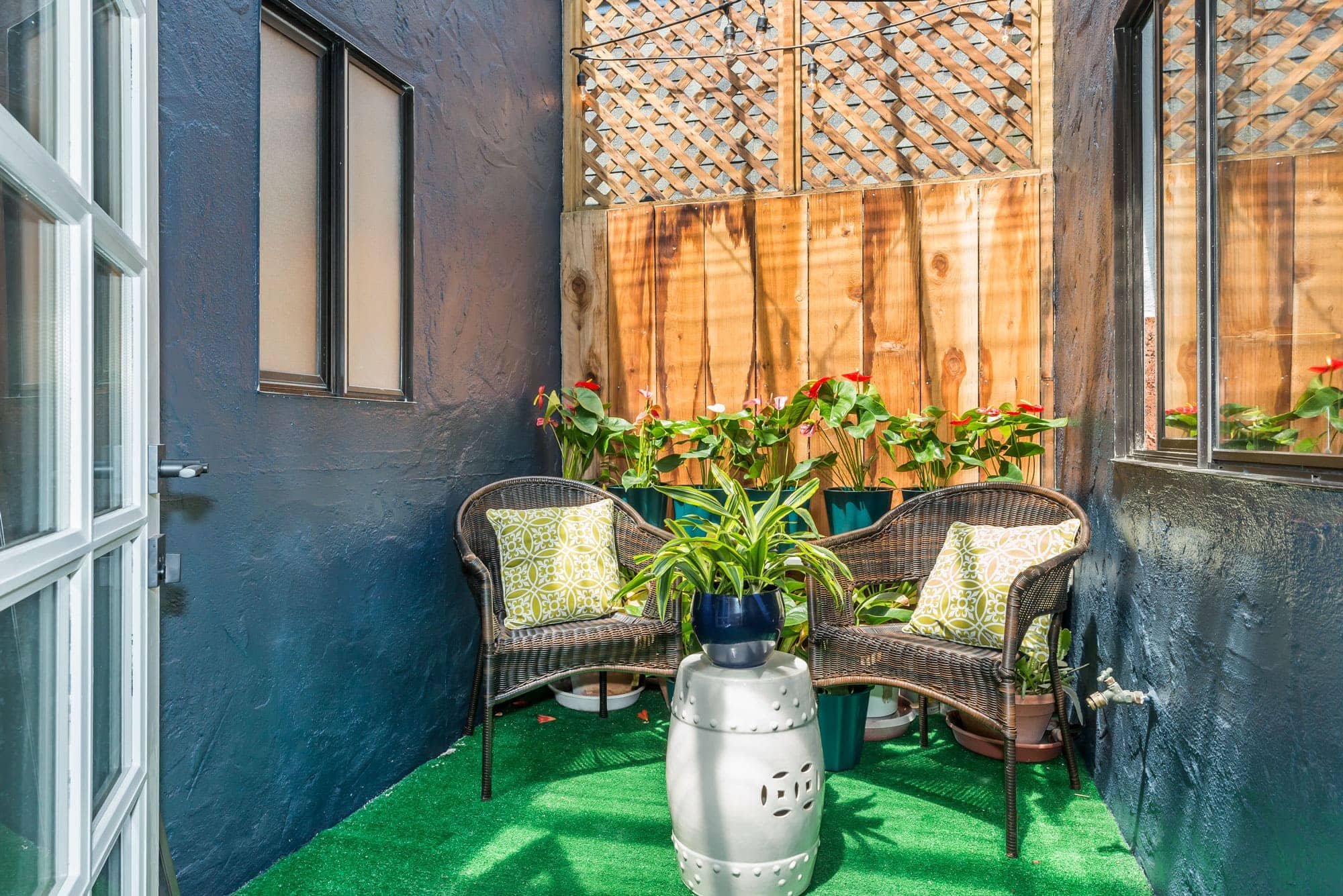Enjoy 375's private deeded center patio is your little enclosed oasis complete with new overhead LED cable lights, astro turf and water tap for all those gardening projects.