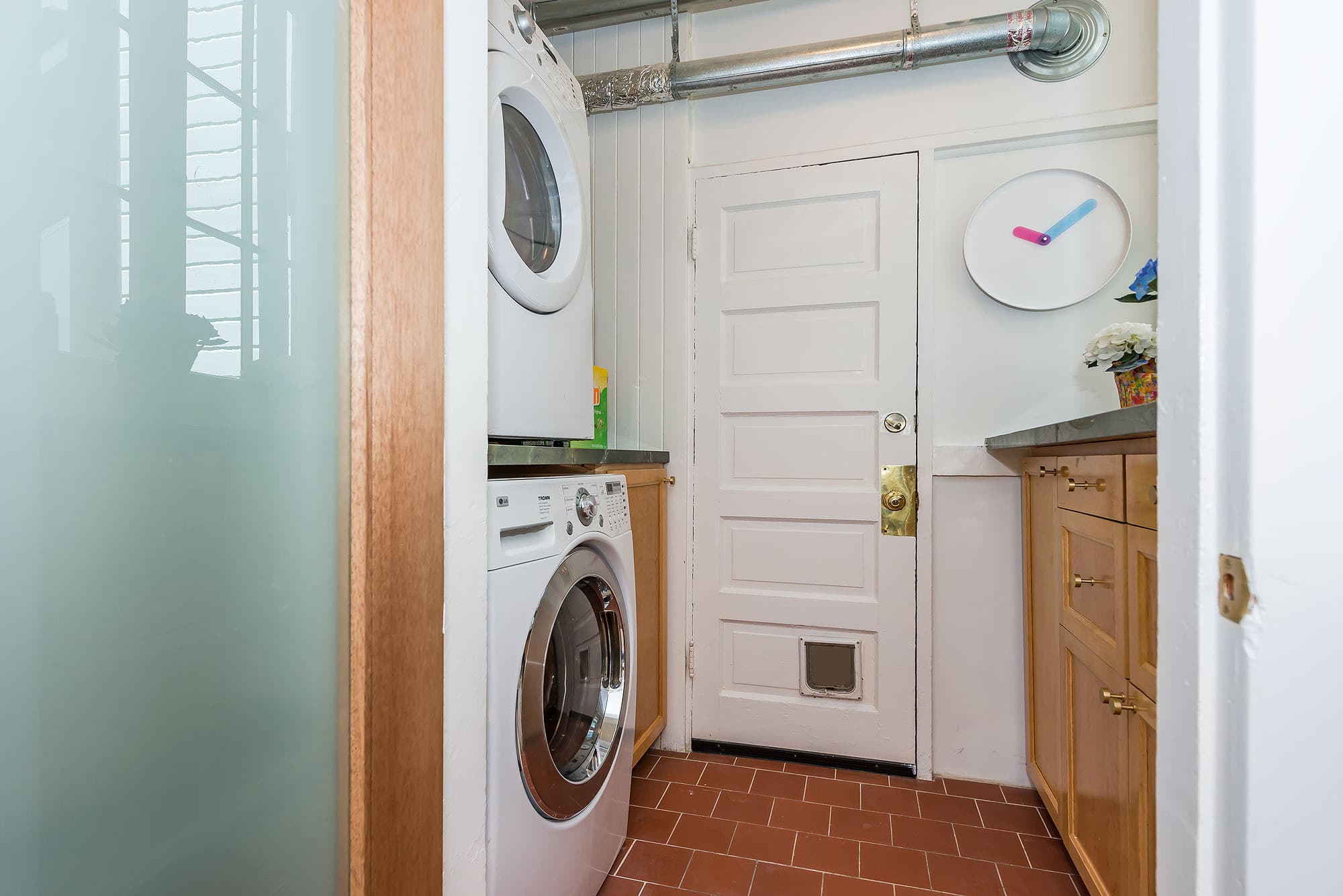 Why share laundry machines with anyone else? 714 Page has its own laundry room (complete with cat door)