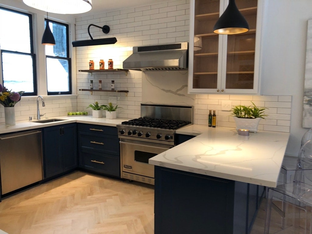 With Pablo brand lights, herringbone floors, new tile, and expertly painted cabinets, we helped create the right, look, touch and feel.