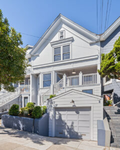 Clad in Benjamin Moore’s Pelican Gray, 234 Eureka’s front façade features a second-floor entry porch, which American Queen Anne Victorian homes used frequently.