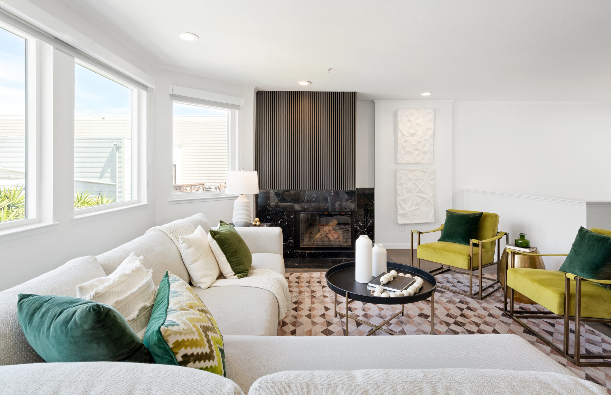 _DSC8706 Chic living room at 36 Houston with sectional seating, dramatic fireplace, and wide windows. SFAR MLS #425032188.
